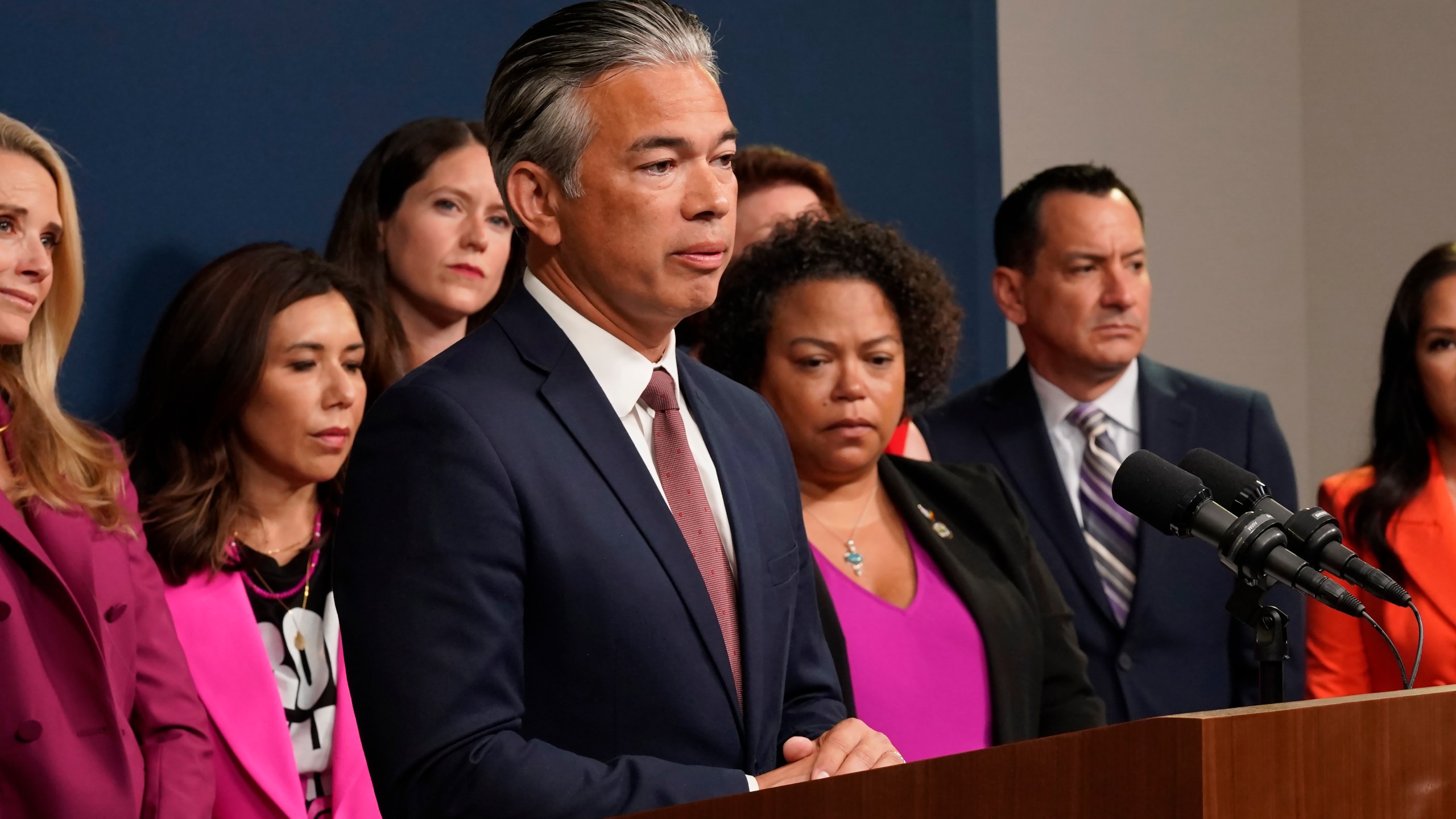 FILE - California Attorney General Rob Bonta discusses the Supreme Court's decision to overturn Roe v Wade, during a news conference in Sacramento, Calif., on June 24, 2022. California has joined with law firms and advocacy groups to create a hotline that provides access to information and pro bono services for people who need legal help related to abortion, as the state seeks to become a safe haven for reproductive rights since Roe v. Wade was overturned. Bonta and officials with the Southern California Legal Alliance for Reproductive Justice made the announcement on Tuesday, one year since the U.S. Supreme Court draft decision reversing Roe was leaked. (AP Photo/Rich Pedroncelli, File)