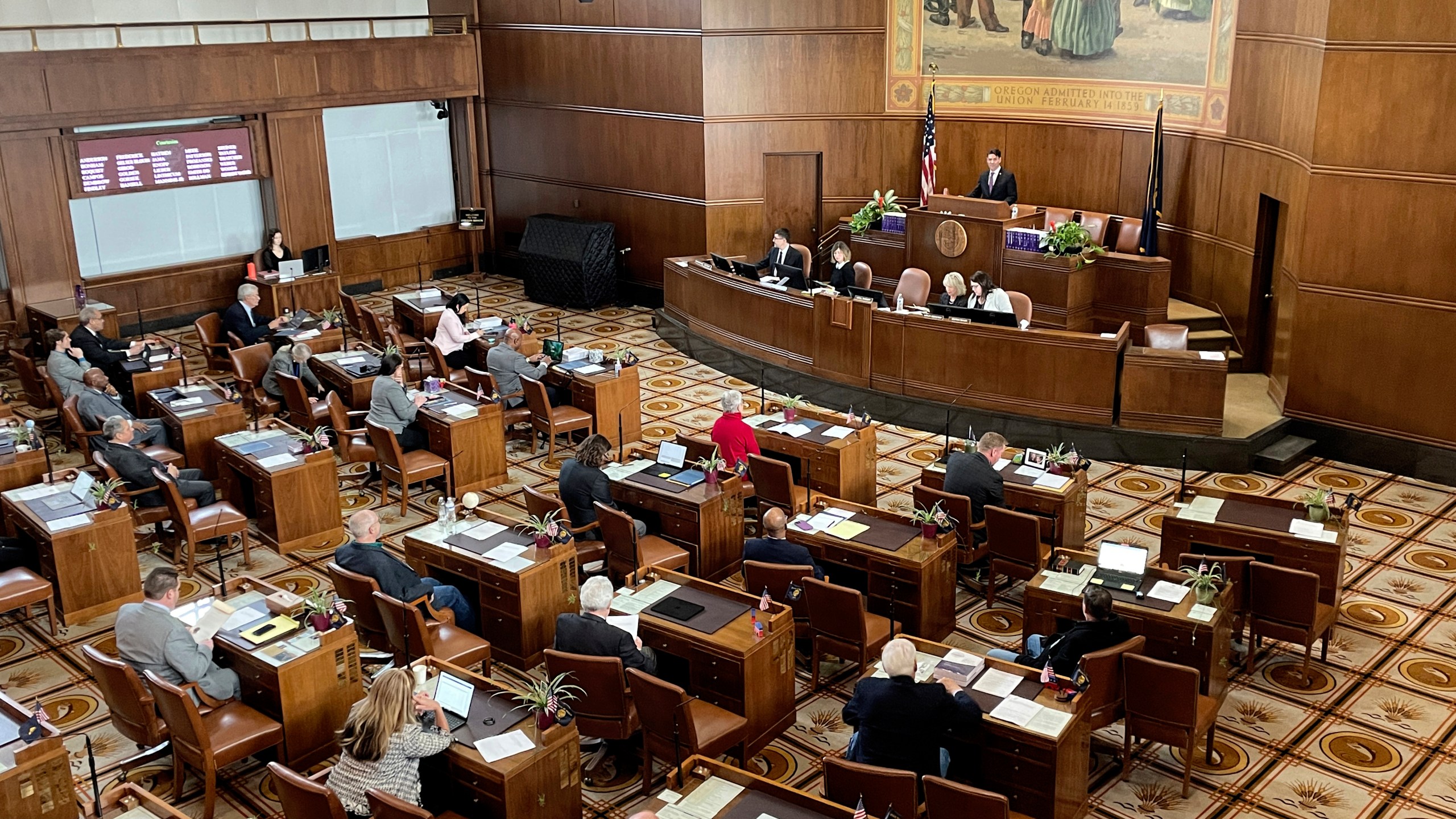 FILE - The Oregon state Senate convenes for the first day of the legislative session on Jan. 17, 2023, at the state Capitol in Salem, Ore. Republicans were absent from the Oregon state Senate, Wednesday, May 3, 2023, heightening partisan tensions ahead of planned votes on abortion and gun control bills. (AP Photo/Claire Rush, File)