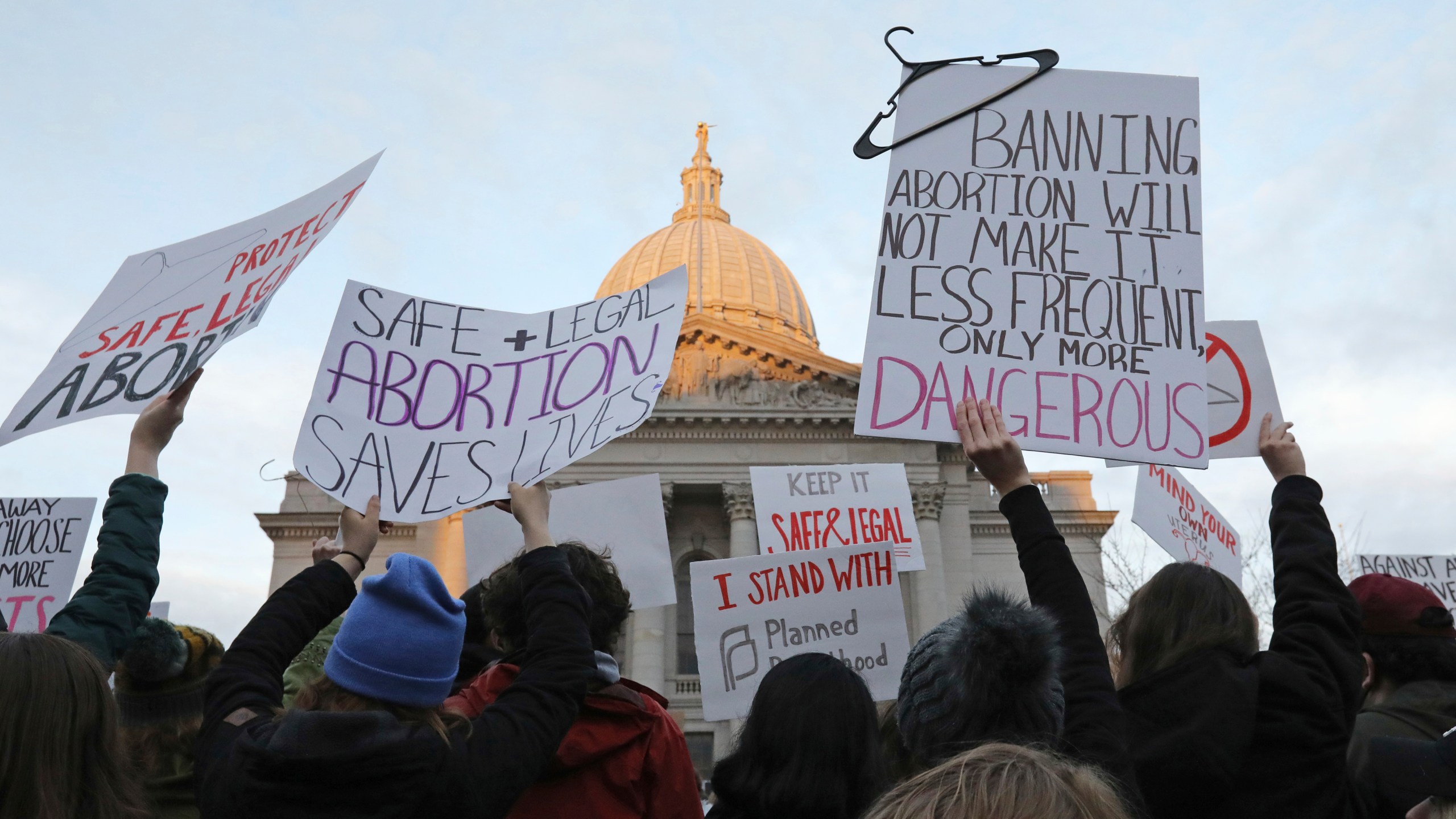 FILE - Demonstrators protest outside the state Capitol in Madison, Wis., on May 3, 2022, in response to the news that the U.S. Supreme Court could be poised to overturn the landmark Roe v. Wade case that legalized abortion nationwide. A Wisconsin judge is set to consider Thursday, May 4, 2023, whether the state's attorney general can legally challenge the battleground state's 174-year-old abortion ban and whether the ban is so old its unenforceable. (Amber Arnold/Wisconsin State Journal via AP, File)