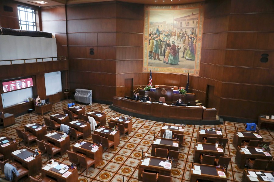 The Senate chambers sits nearly empty at the Oregon State Capitol in Salem, Ore., Thursday, May 4, 2023. Republican members of the Oregon Senate on Thursday extended their boycott of Senate proceedings into a second day, delaying action by the majority Democrats on bills on gun safety, abortion rights and gender-affirming health care. (AP Photo/Amanda Loman)