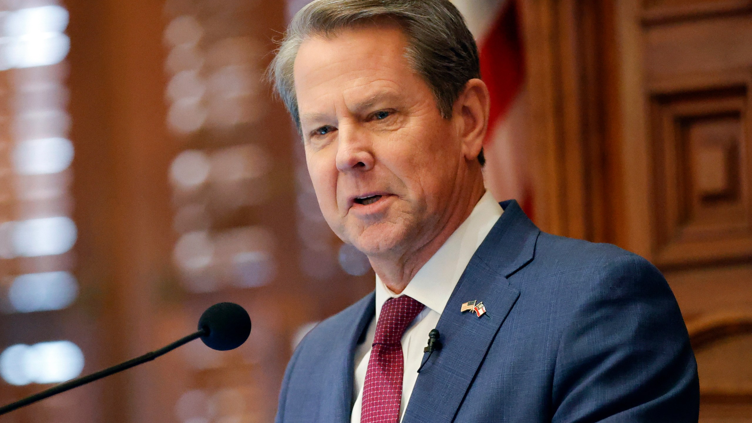 FILE - Georgia Gov. Brian Kemp delivers the State of the State address on the House floor of the state Capitol on Jan. 25, 2023 in Atlanta. The Republican Kemp signed a law on Friday, May 5, creating a commission that can discipline and remove elected prosecutors, saying the measure will curb “far-left prosecutors” who are “making our communities less safe.” (AP Photo/Alex Slitz, File)