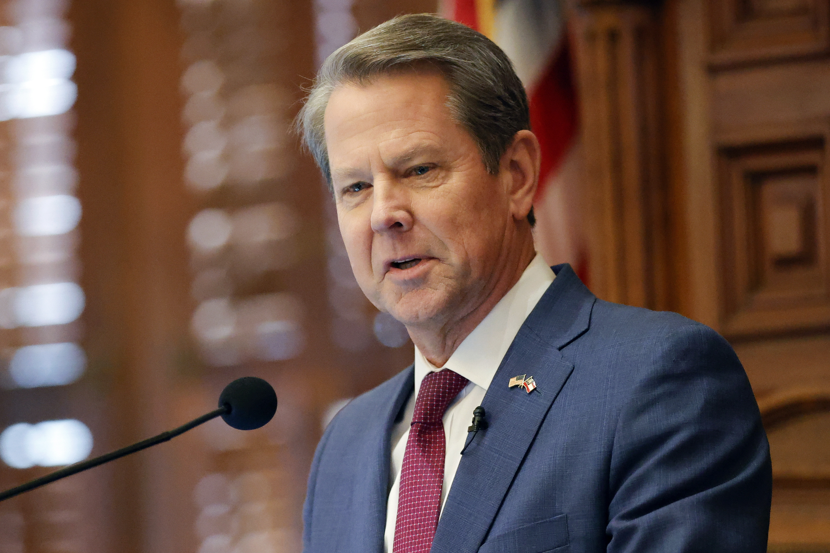 FILE - Georgia Gov. Brian Kemp delivers the State of the State address on the House floor of the state Capitol on Jan. 25, 2023 in Atlanta. The Republican Kemp signed a law on Friday, May 5, creating a commission that can discipline and remove elected prosecutors, saying the measure will curb “far-left prosecutors” who are “making our communities less safe.” (AP Photo/Alex Slitz, File)