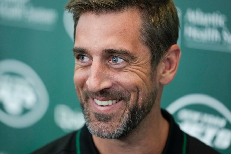 New York Jets' quarterback Aaron Rodgers talks to reporters after an NFL football press conference at the Jets' training facility in Florham Park, N.J., Wednesday, April 26, 2023. (AP Photo/Seth Wenig)