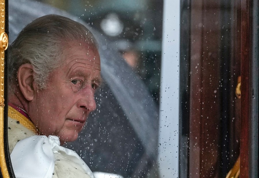 Britain's King Charles III makes his way to Westminster Abbey prior to his coronation ceremony in London Saturday, May 6, 2023. (AP Photo/Alessandra Tarantino)