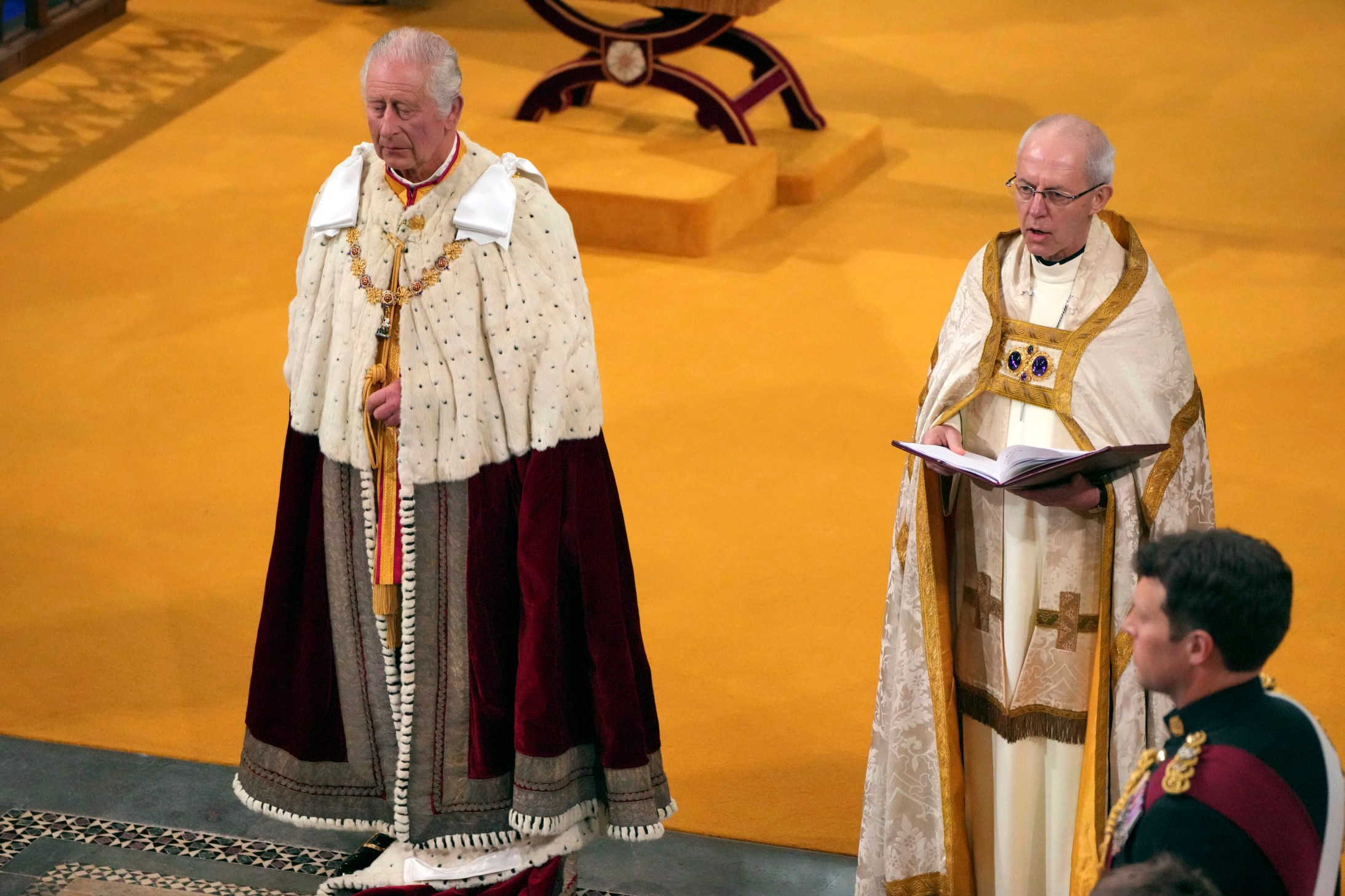 Britain's King Charles III, left, stands next to Archbishop of Canterbury Justin Welby during his coronation ceremony in Westminster Abbey, London, Saturday, May 6, 2023. (Aaron Chown/Pool Photo via AP)