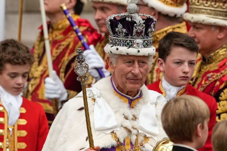 Britain's King Charles III departs Westminster Abbey after his coronation ceremony in London Saturday, May 6, 2023. (AP Photo/Alessandra Tarantino)