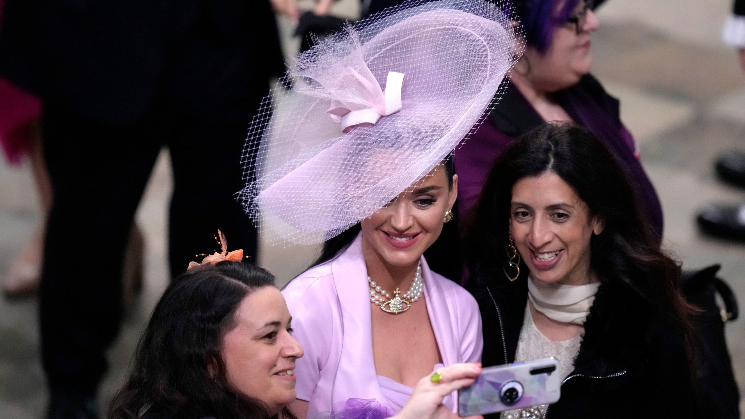 Singer Katy Perruy is photographed after the coronation ceremony of Britain's King Charles III at Westminster Abbey in London Saturday, May 6, 2023. (AP Photo/Kirsty Wigglesworth, Pool)