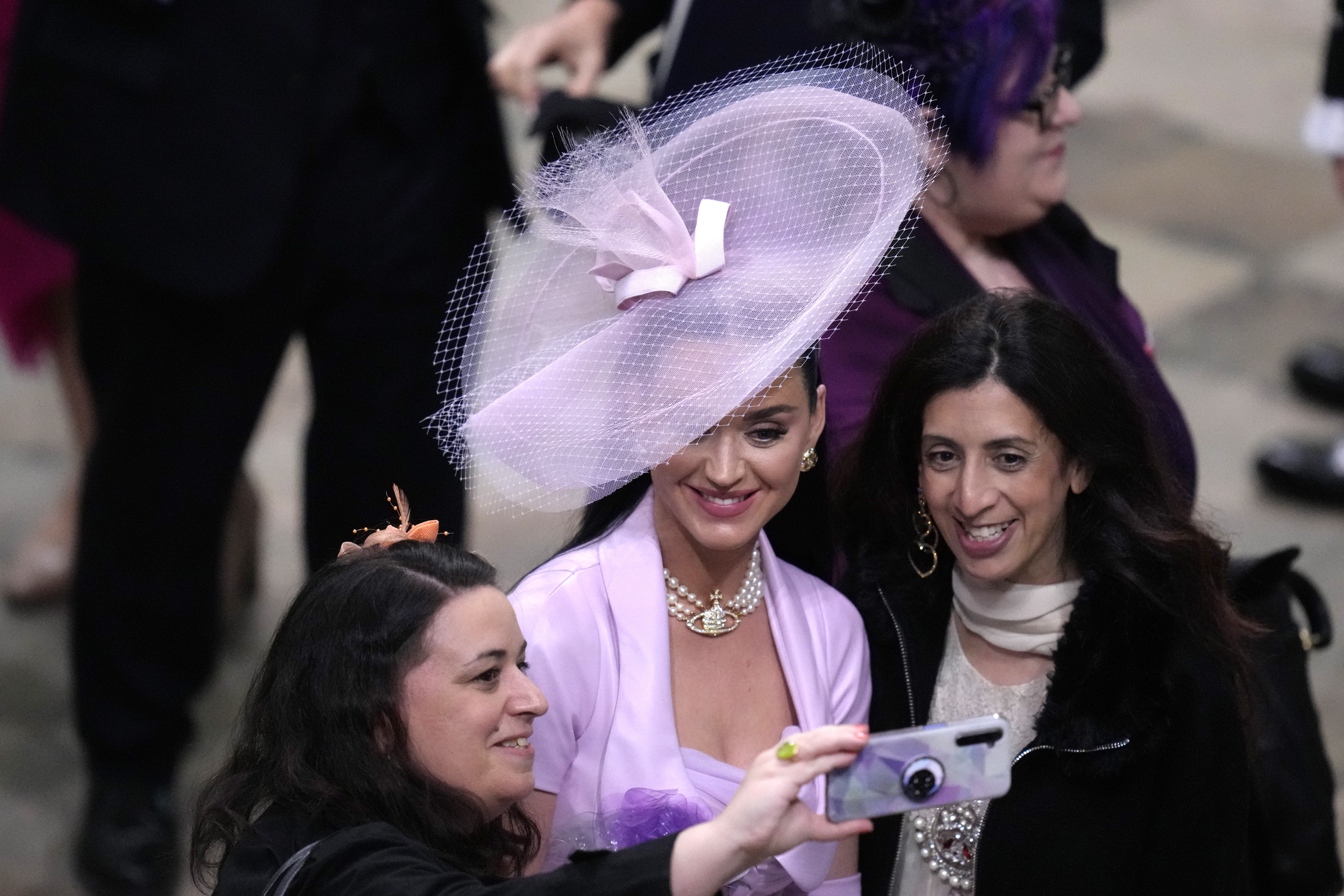 Singer Katy Perruy is photographed after the coronation ceremony of Britain's King Charles III at Westminster Abbey in London Saturday, May 6, 2023. (AP Photo/Kirsty Wigglesworth, Pool)