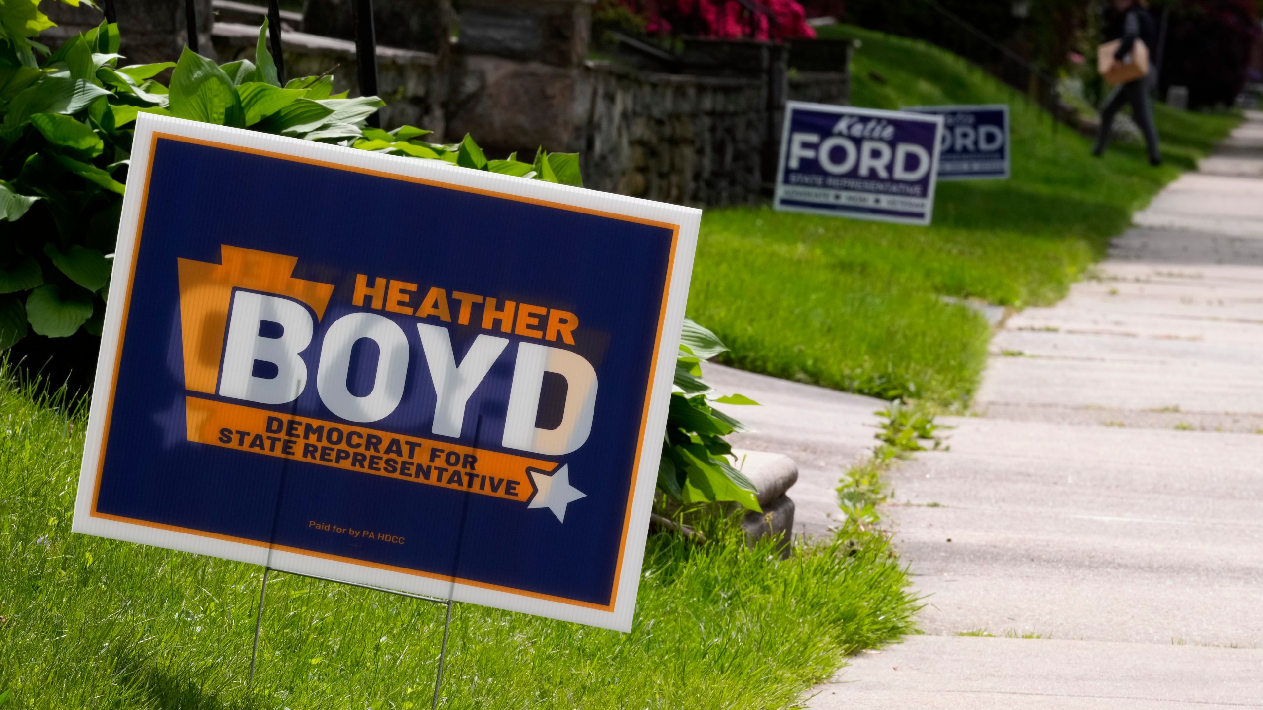 Campaign signs for Heather Boyd and Katie Ford are seen, Thursday, May 4, 2023, in Aldan, Pa. The two are running in a special election in the Philadelphia suburbs that will determine whether Democrats in the Pennsylvania House of Representatives will maintain control of the chamber or if Republicans will reclaim the majority control they held for 12 years until this January. (AP Photo/Matt Slocum)