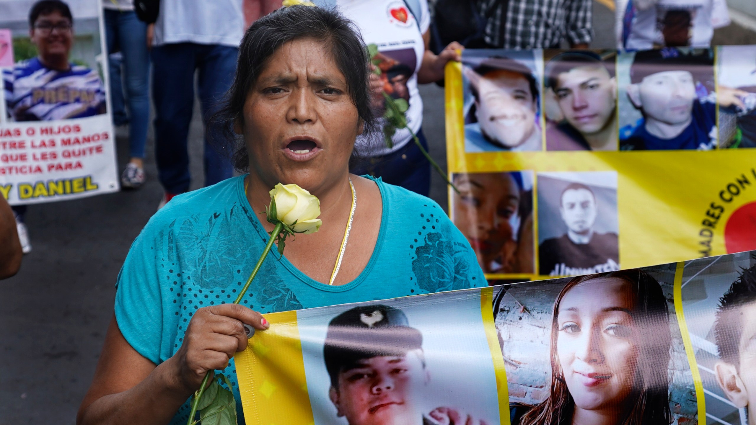 Mothers with disappeared children march to demand government help in the search for their missing loved ones on Mother's Day in Mexico City, Wednesday, May 10, 2023. (AP Photo/Marco Ugarte)