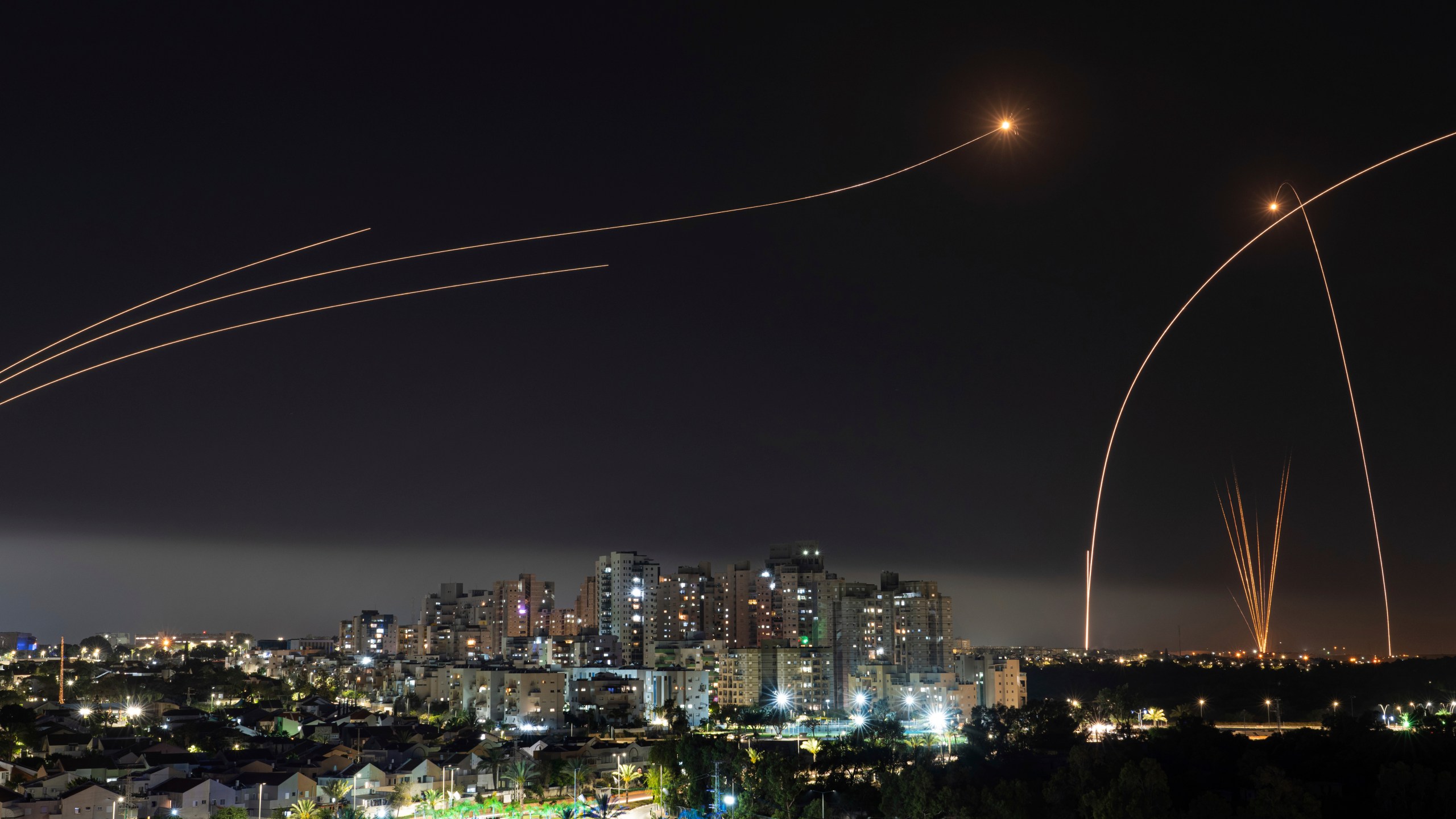 Israel's Iron Dome missile defense system fires interceptors at rockets launched from the Gaza Strip, in Ashkelon, southern Israel. Thursday, May 11, 2023. (AP Photo/Tsafrir Abayov)