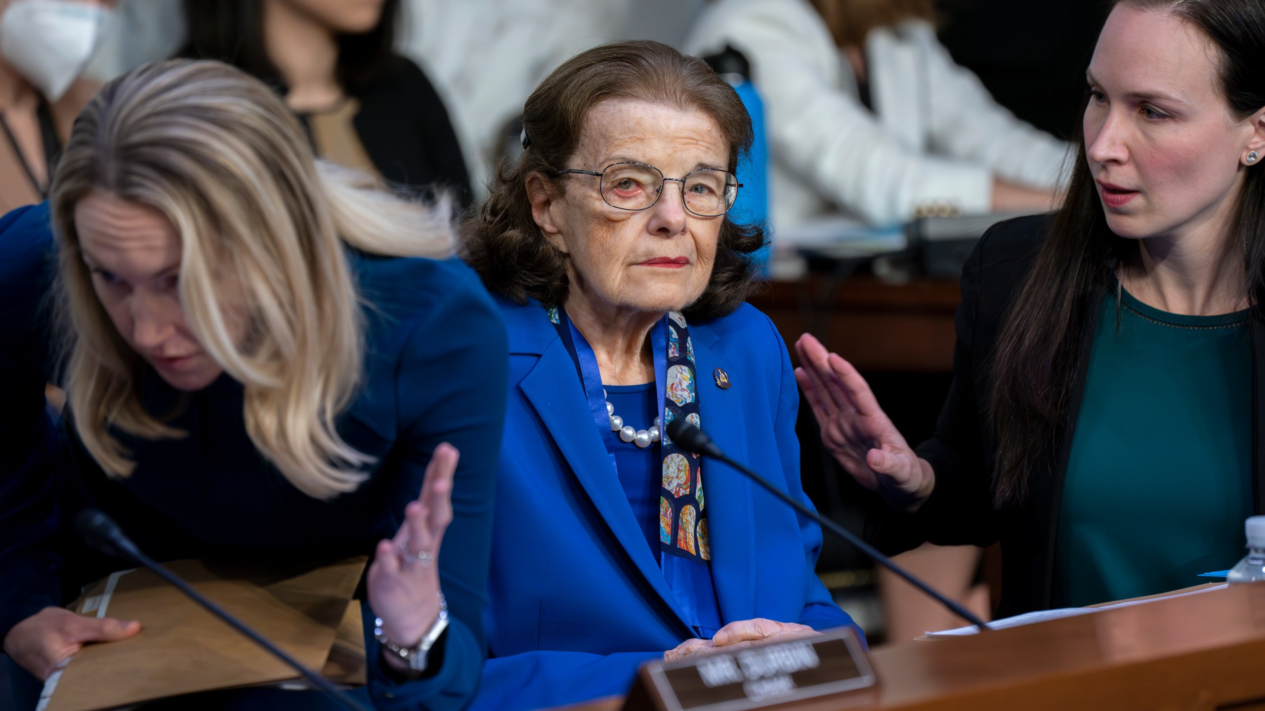 Sen. Dianne Feinstein, D-Calif., is flanked by aides as she returns to the Senate Judiciary Committee following a more than two-month absence as she was being treated for a case of shingles, at the Capitol in Washington, Thursday, May 11, 2023. Senate Judiciary Committee Chairman Dick Durbin, D-Ill., has been delayed in advancing many of President Joe Biden's judicial nominees because of the 89-year-old Feinstein's absence. (AP Photo/J. Scott Applewhite)