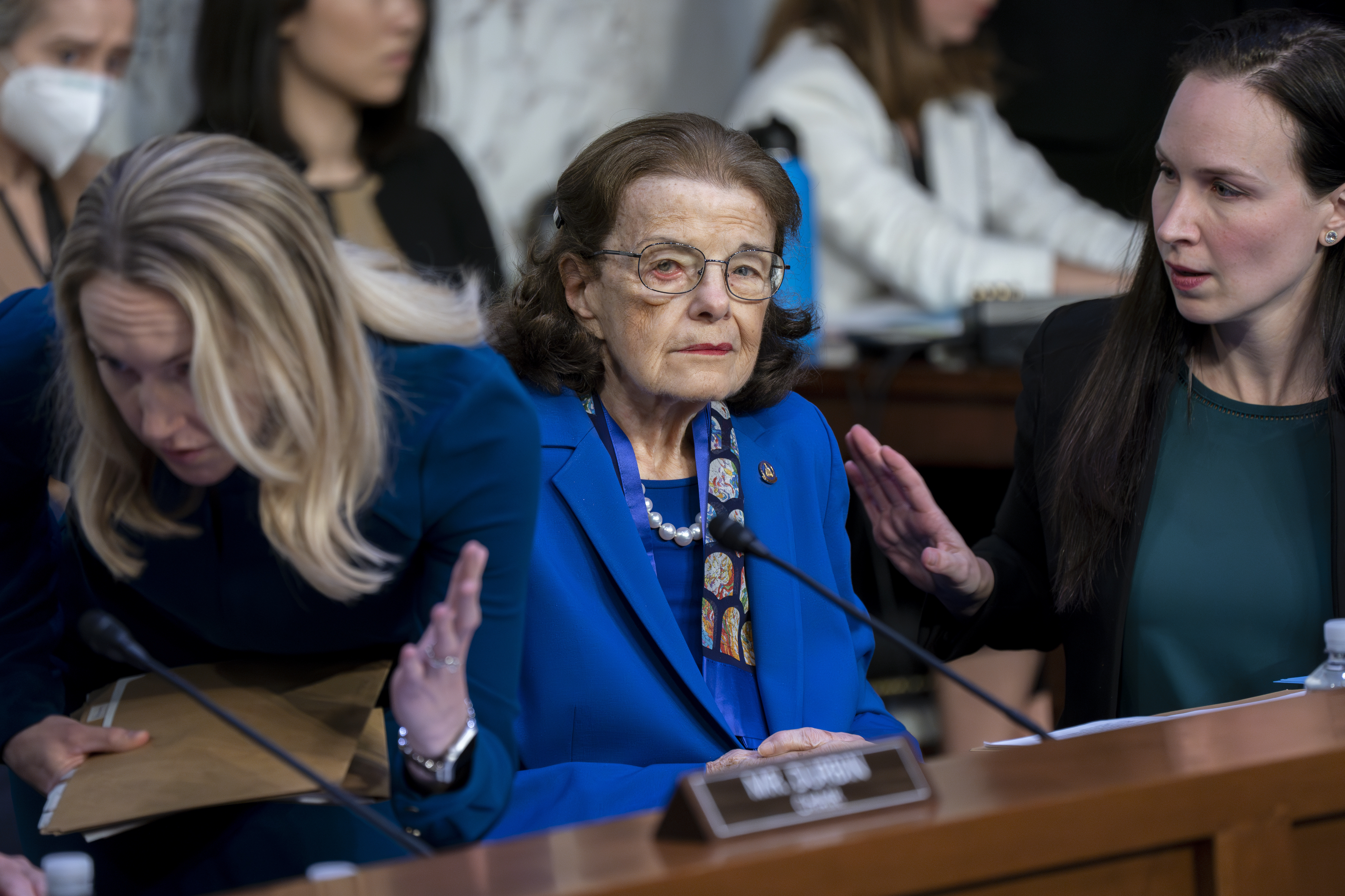 Sen. Dianne Feinstein, D-Calif., is flanked by aides as she returns to the Senate Judiciary Committee following a more than two-month absence as she was being treated for a case of shingles, at the Capitol in Washington, Thursday, May 11, 2023. Senate Judiciary Committee Chairman Dick Durbin, D-Ill., has been delayed in advancing many of President Joe Biden's judicial nominees because of the 89-year-old Feinstein's absence. (AP Photo/J. Scott Applewhite)