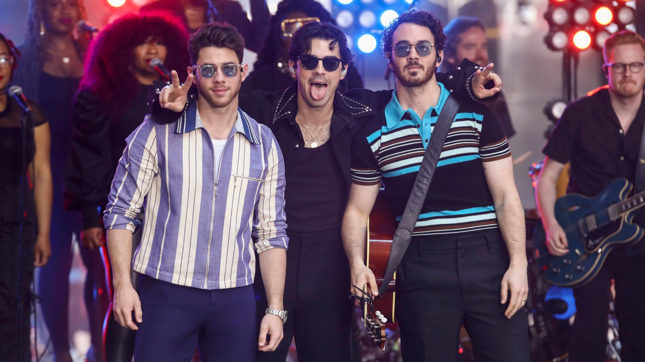 Nick Jonas, from left, Joe Jonas and Kevin Jonas of the Jonas Brothers perform on NBC's Today show at Rockefeller Plaza on Friday, May 12, 2023, in New York. (Photo by Andy Kropa/Invision/AP)