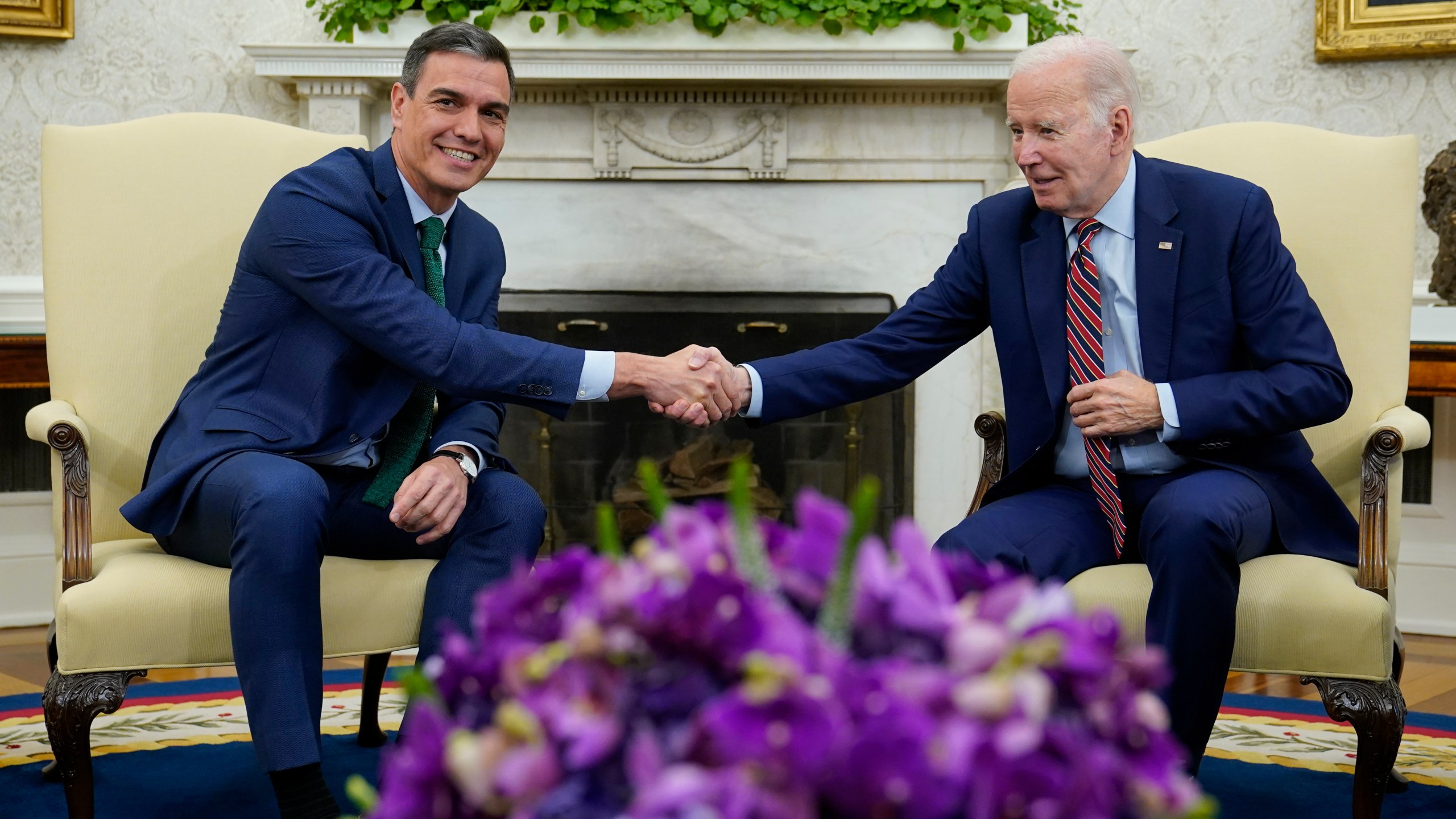 President Joe Biden shakes hands with Spain's Prime Minister Pedro Sanchez as they meet in the Oval Office of the White House in Washington, Friday, May 12, 2023. (AP Photo/Susan Walsh)