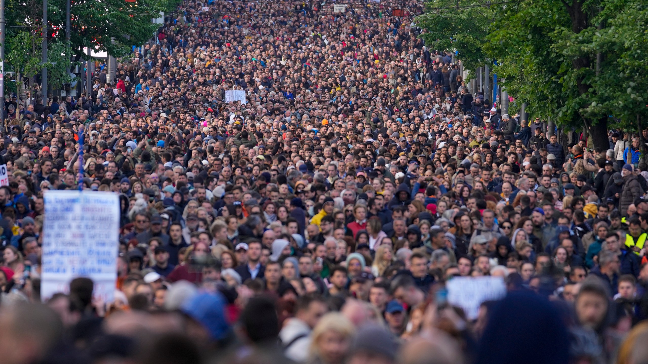 People march during a rally against violence in Belgrade, Serbia, Friday, May 12, 2023. Serbia’s populist leader has sharply denounced opposition plans to block a key bridge and highway in Belgrade on Friday to press their demands in the wake of last week’s mass shootings in the Balkan country that left 17 people dead, including many children. (AP Photo/Darko Vojinovic)