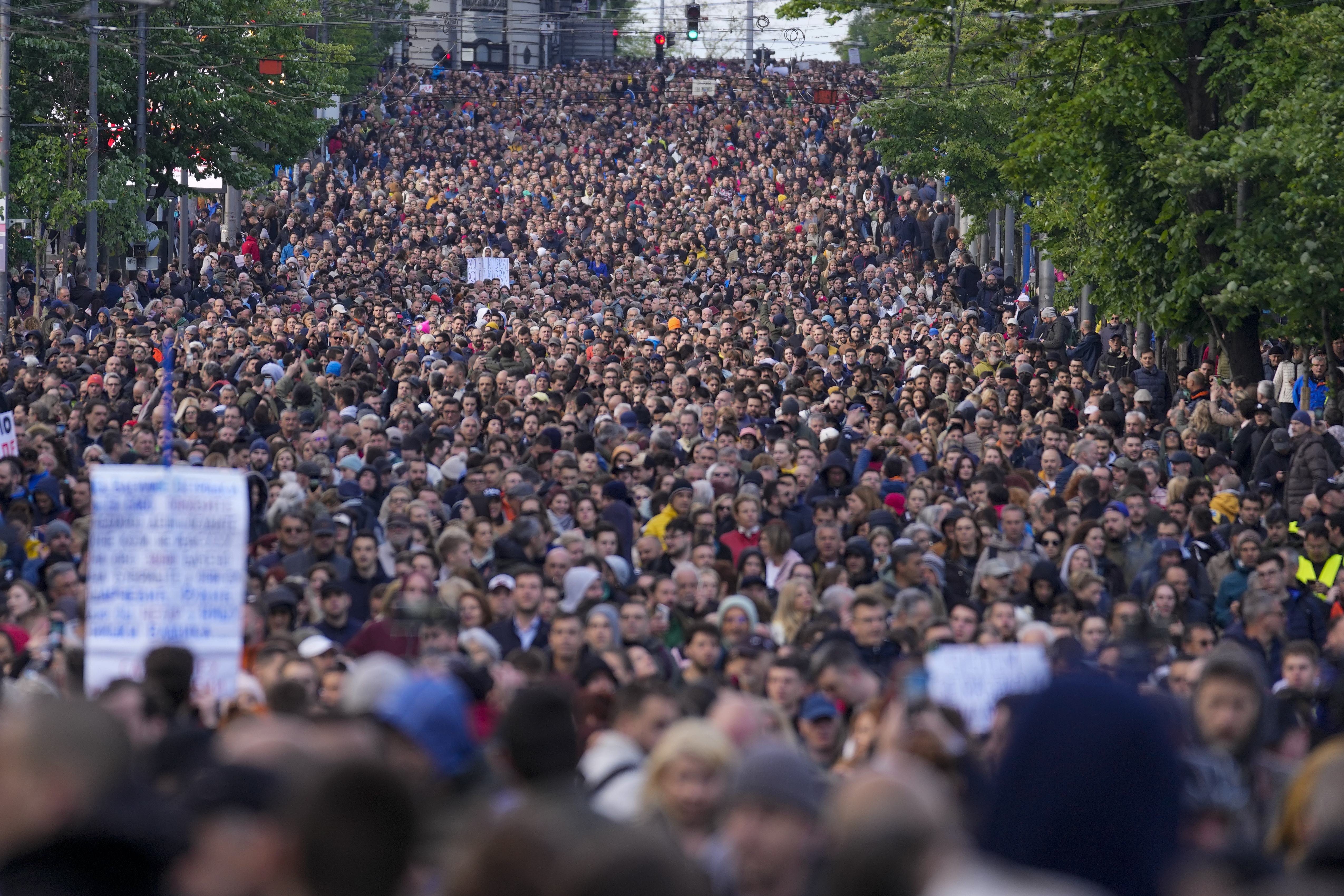 People march during a rally against violence in Belgrade, Serbia, Friday, May 12, 2023. Serbia’s populist leader has sharply denounced opposition plans to block a key bridge and highway in Belgrade on Friday to press their demands in the wake of last week’s mass shootings in the Balkan country that left 17 people dead, including many children. (AP Photo/Darko Vojinovic)