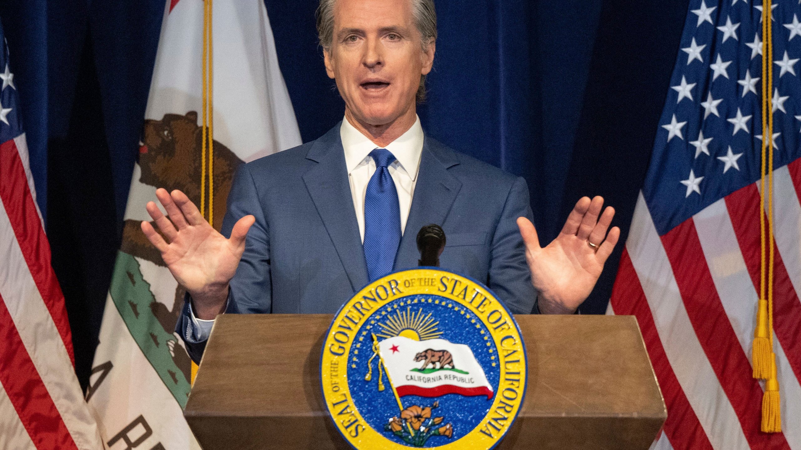 California Gov. Gavin Newsom announces the May budget revision on Friday, May 12, 2023 in Sacramento, Calif. Newsom said Friday the state's budget deficit has grown to nearly $32 billion. That's about $10 billion more than predicted in January, when the governor offered his first budget proposal. (Hector Amezcua/The Sacramento Bee via AP)