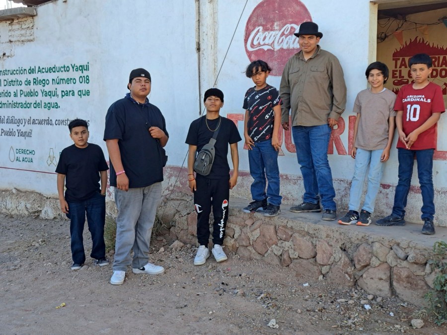 Members of the Pascua Yaqui Tribe pose for a photo in their tribal community in Sonora, Mexico. in March, 2023. (Raymond V. Buelna via AP)