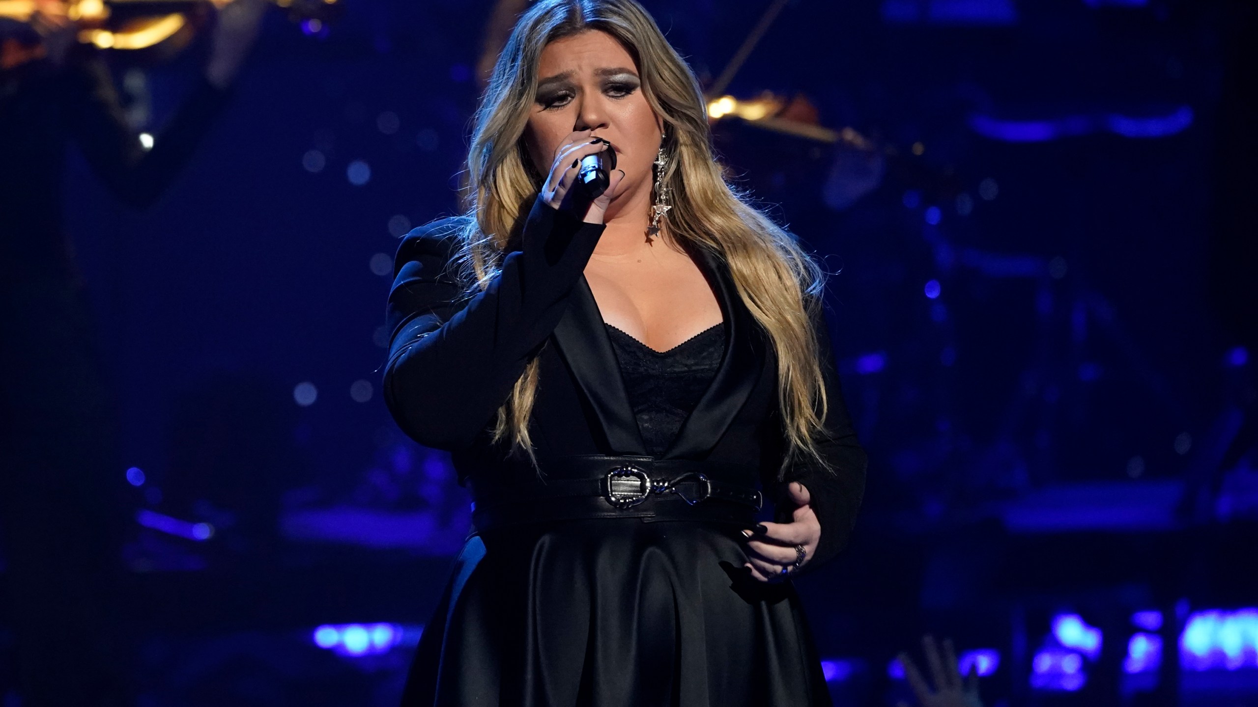 FILE - Kelly Clarkson performs during a tribute to Icon award winner Pink at the iHeartRadio Music Awards on Monday, March 27, 2023, at the Dolby Theatre in Los Angeles. Clarkson has responded, Saturday, May 13, to a Rolling Stone report accusing her daytime talk show of being a toxic workplace. She addressed the allegations after 11 current and former employees complained about being overworked and underpaid on “The Kelly Clarkson Show” in which they also called “traumatizing to their mental health” in the magazine’s Friday report. (AP Photo/Chris Pizzello, File)