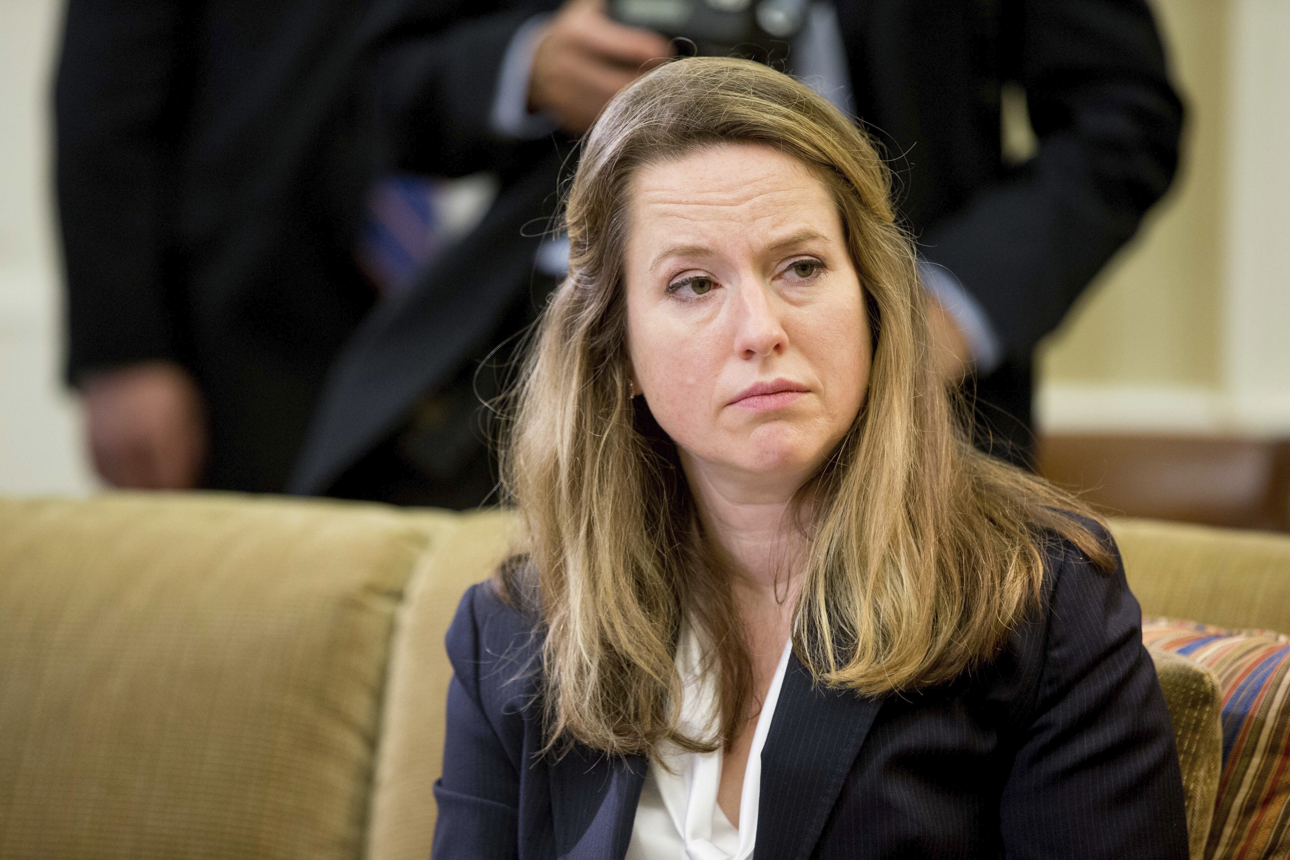 FILE - Deputy Homeland Security Adviser Amy Pope listens as President Barack Obama speaks in the Oval Office at the White House in Washington, May 20, 2016. International Organization for Migration chief Antonio Vitorino of Portugal faces what is poised to be a tight race against his Biden administration-backed American deputy, Amy Pope, as the Geneva-based organization chooses a new director-general on Monday, May 15, 2023. (AP Photo/Andrew Harnik, File)