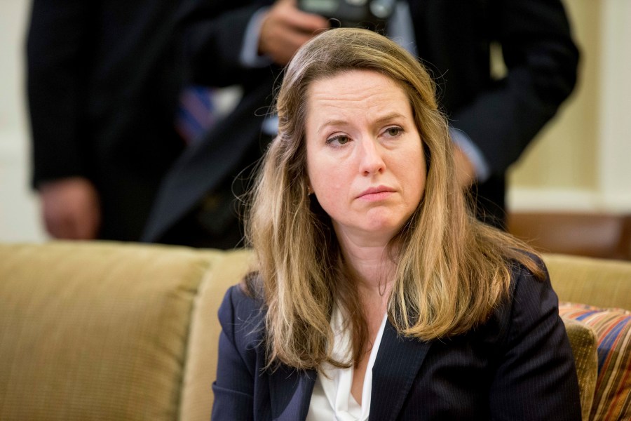 FILE - Deputy Homeland Security Adviser Amy Pope listens as President Barack Obama speaks in the Oval Office at the White House in Washington, May 20, 2016. International Organization for Migration chief Antonio Vitorino of Portugal faces what is poised to be a tight race against his Biden administration-backed American deputy, Amy Pope, as the Geneva-based organization chooses a new director-general on Monday, May 15, 2023. (AP Photo/Andrew Harnik, File)