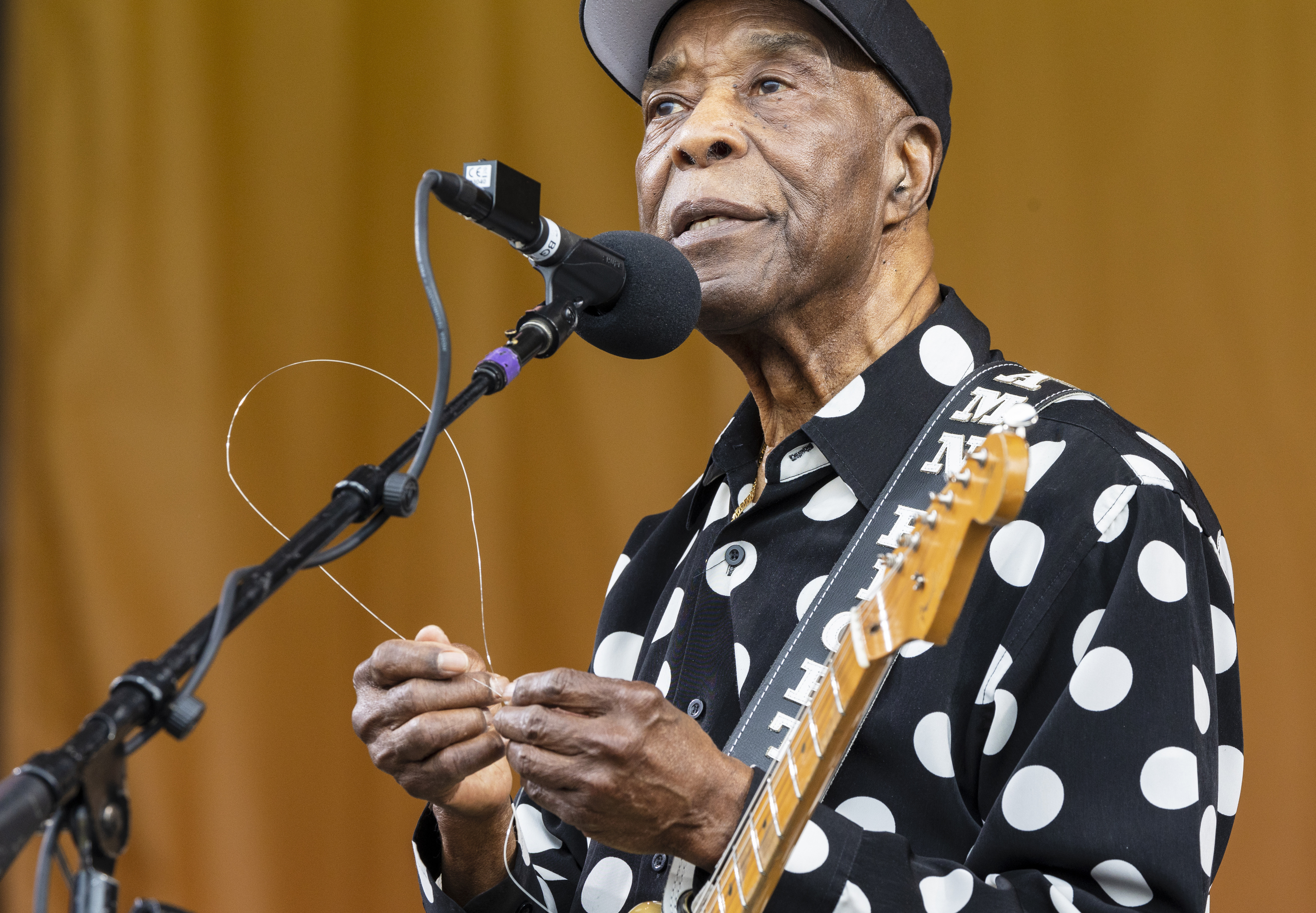 FILE - Buddy Guy plays with one of his guitar strings after it broke off during his performance on the Festival Stage at the New Orleans Jazz & Heritage Festival, May 4, 2023, in New Orleans. Blues mainstays Buddy Guy, Albert Castiglia and John Nemeth each won two awards and Tommy Castro took home the prize of B.B. King Entertainer of the Year at the Blues Music Awards in Memphis, Tenn., Thursday, May 11. (Chris Granger/The Times-Picayune/The New Orleans Advocate via AP, File)