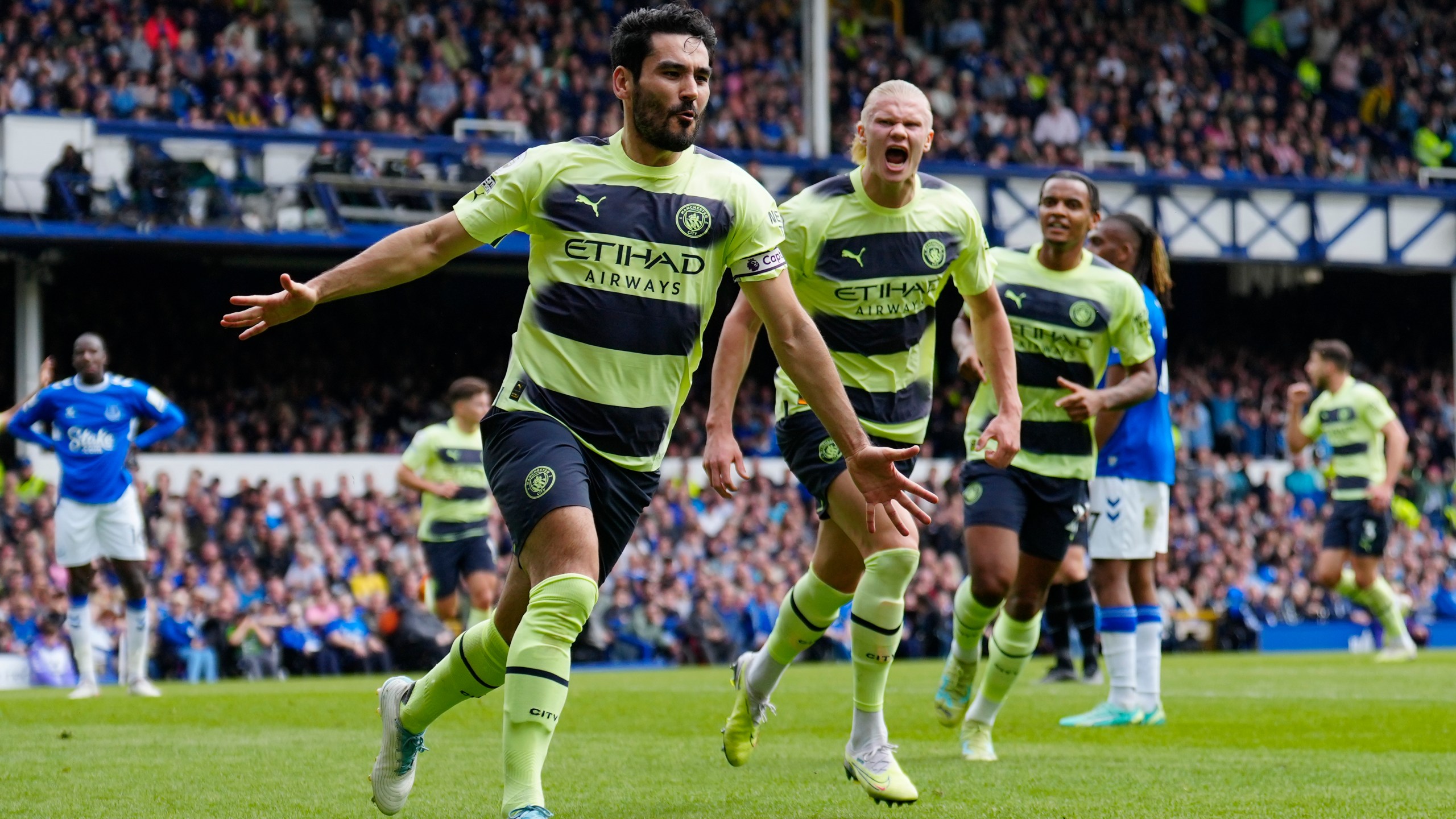 Manchester City's Ilkay Gundogan celebrates after scoring his side's opening goal during the English Premier League soccer match between Everton and Manchester City at the Goodison Park stadium in Liverpool, England, Sunday, May 14, 2023. (AP Photo/Jon Super)