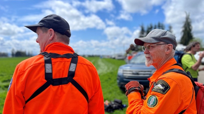 Search and rescue crews found a missing 2-year-old laying in tall grass west of Molalla not far from her home, May 7, 2023 (Clackamas County Sheriff's Office)