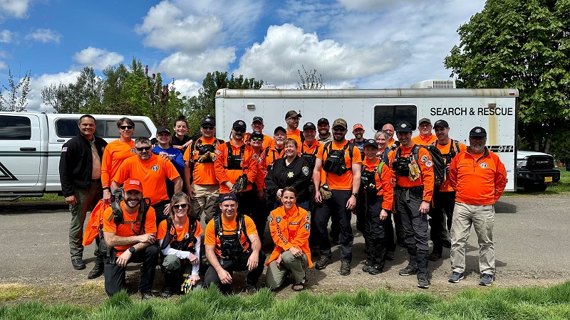 Search and rescue crews found a missing 2-year-old laying in tall grass west of Molalla not far from her home, May 7, 2023 (Clackamas County Sheriff's Office)